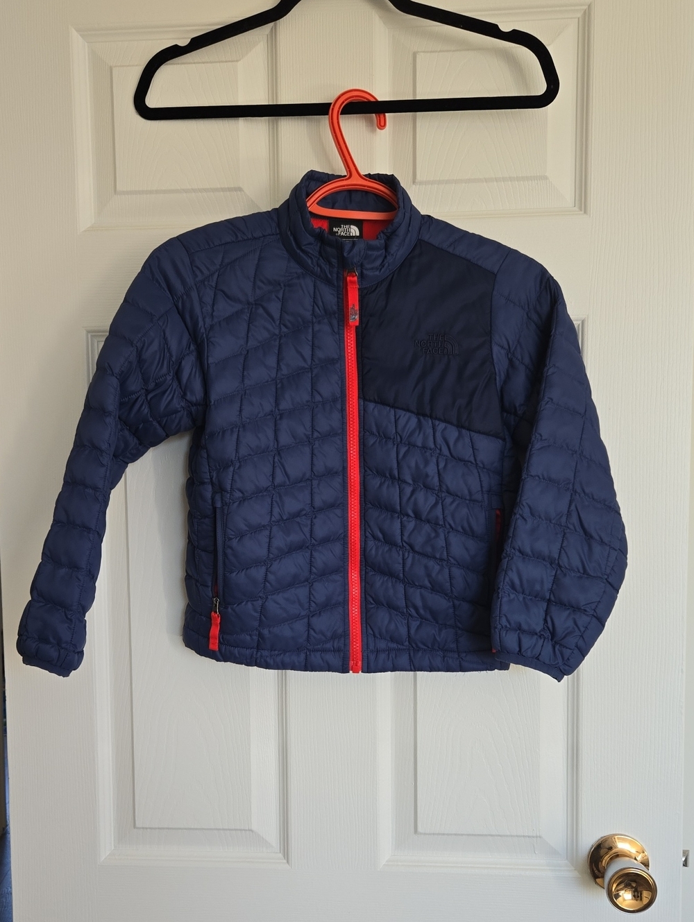 The North Face Kids Navy Puffer Jacket with Red Trim